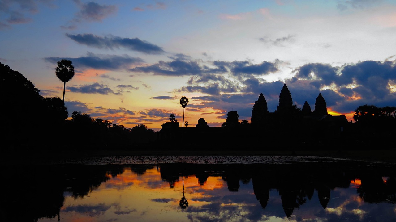 Angkor Wat temple at sunrise reflected in water
