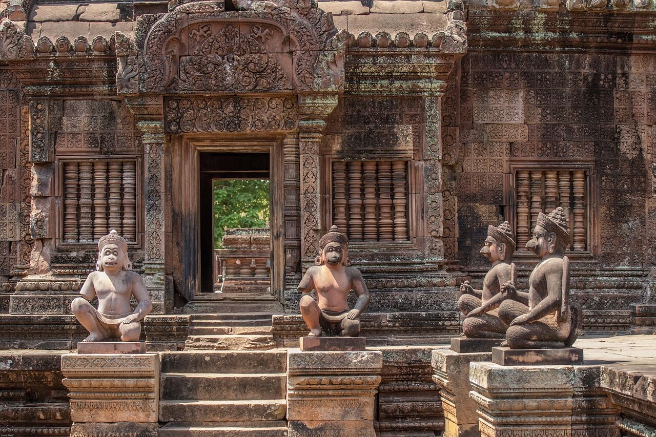 Intricate pink sandstone carvings at Banteay Srei temple